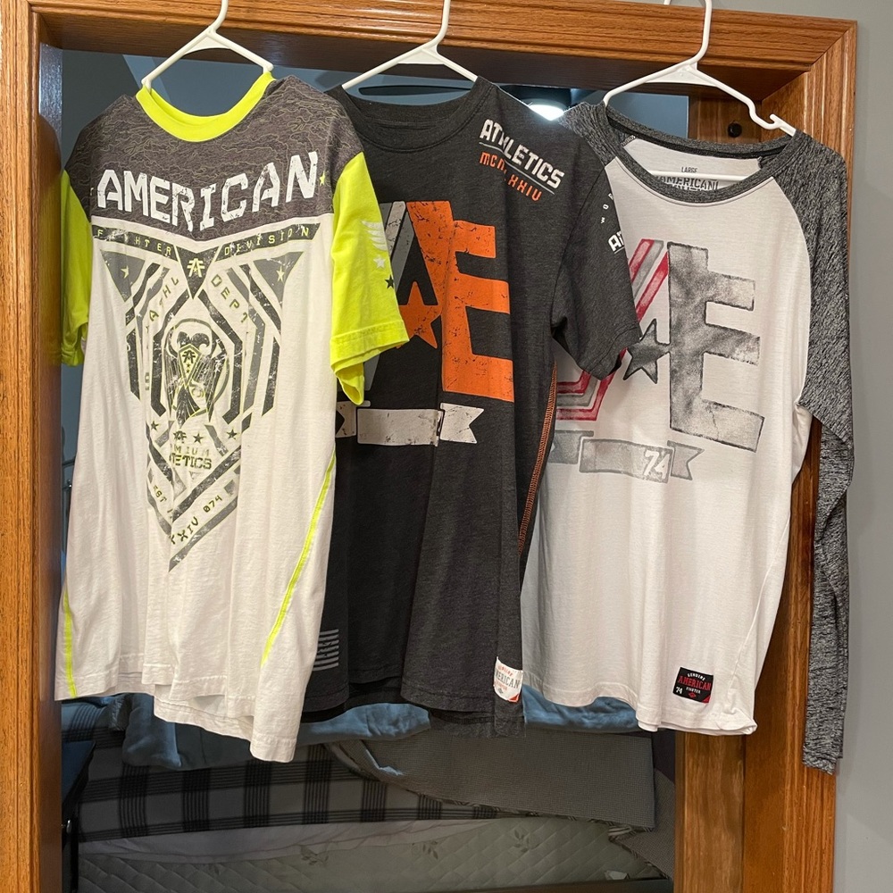 Lot of 3 men’s American fighter shirts. EUC